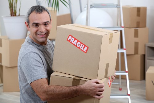 Careful lifting of items from a Bloomsbury flat with stairs