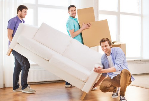 Packed boxes and furniture prepared for a flat move in Bloomsbury
