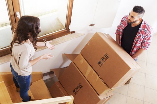 Removal van and movers handling access in central London